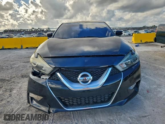 ✅ 2016 Nissan Maxima SL • VIN: 1N4AA6AP6GC411188 • Лот: 94697265. Опубликован ранее на Copart с пробегом 170 502 миль. Бесплатный доступ к архиву аукционных продаж из США и подробный отчёт об истории автомобиля на DreamBid. Изображение 5.