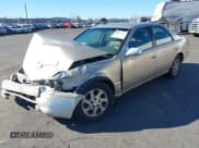 ✅ 2000 Toyota Camry LE • VIN: JT2BG22K6Y0383168 • Лот: 41542927. Опубликован ранее на IAAI с пробегом 206 712 миль. Бесплатный доступ к архиву аукционных продаж из США и подробный отчёт об истории автомобиля на DreamBid. Изображение 2.