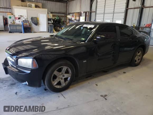 2010 Dodge Charger SXT z VIN 2B3CA3CV1AH124053, wystawiony jako Copart lot #57555754 z przebiegiem 136 256 mil mil oraz Szkoda całkowita • Salvage title. Historia ofert i sprzedaży dostępna na DreamBid. Obrazek 1.