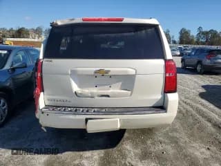 ✅ 2015 Chevrolet Suburban LTZ • VIN: 1GNSKKKC1FR734292 • Lot: 80950874. Wystawiony na Copart z przebiegiem 78 974 mil. Bezpłatny archiwum sprzedaży aukcyjnych z USA i szczegółowy raport historii pojazdu na DreamBid. Zdjęcie 6.