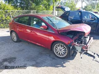 ✅ 2014 Ford Focus Titanium • VIN: 1FADP3N2XEL447942 • Lot: 43708018. Listed on IAAI with 172,069 mi. Free auction sales archive from the USA and detailed vehicle history report at DreamBid. Image 1.