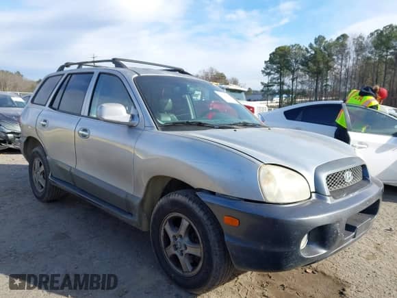 2004 Hyundai Santa Fe GLS z VIN KM8SC13EX4U799955, wystawiony jako IAAI lot #41240442 z przebiegiem 281 394 mil mil oraz . Historia ofert i sprzedaży dostępna na DreamBid. Obrazek 1.