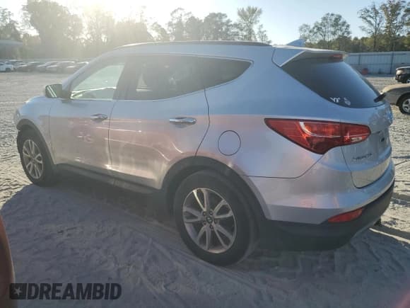 ✅ 2015 Hyundai Santa Fe Limited • VIN: 5XYZUDLAXFG288779 • Lot: 76032854. Listed on Copart with 118,358 mi. Free auction sales archive from the USA and detailed vehicle history report at DreamBid. Image 2.