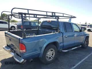 2002 Dodge Dakota SLT z VIN 1B7HL48N52S632677, wystawiony jako Copart lot #76509804 z przebiegiem 241 947 mil mil oraz Szkoda całkowita • Salvage title. Historia ofert i sprzedaży dostępna na DreamBid. Obrazek 3.