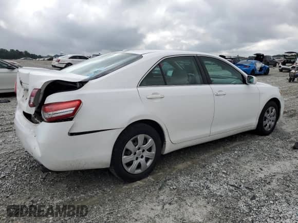 2011 Toyota Camry LE с VIN 4T1BF3EK5BU584051, выставлен на аукционе Copart как лот 85340395 с пробегом 111 598 миль миль и Списание • Salvage title. История ставок и продаж доступна на DreamBid. Изображение 3.
