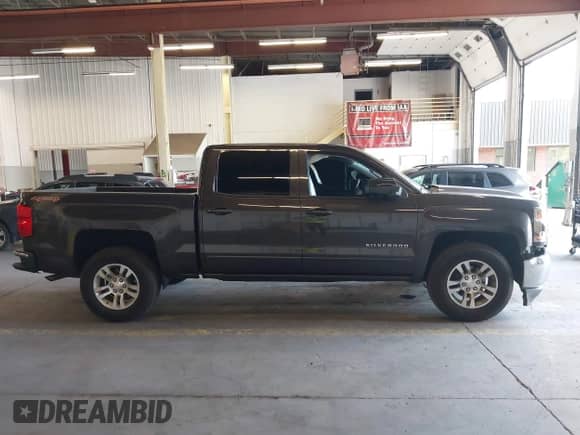 2016 Chevrolet Silverado 1500 LT with VIN 3GCUKREC6GG129840, listed as a IAAI auction lot 43088052 with 123,184 mi miles and . Bid and sale history available at DreamBid. Image 14.