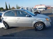 ✅ 2010 Kia Rio LX • VIN: KNADH4A38A6673706 • Lot: 43645629. Listed on IAAI with 145,094 mi. Free auction sales archive from the USA and detailed vehicle history report at DreamBid. Image 13.