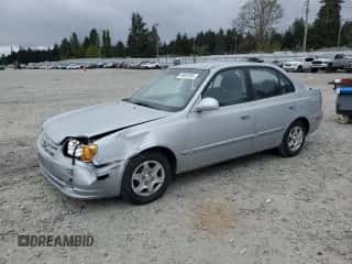 2005 Hyundai Accent GLS z VIN KMHCG45C75U639281, wystawiony jako Copart lot #54887095 z przebiegiem 136 090 mil mil oraz Szkoda całkowita • Salvage title. Historia ofert i sprzedaży dostępna na DreamBid. Obrazek 1.