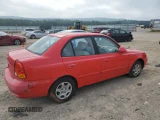 2005 Hyundai Accent GLS z VIN KMHCG45C15U652785, wystawiony jako Copart lot #65780725 z przebiegiem 167 670 mil mil oraz Czysty tytuł • Clean title. Historia ofert i sprzedaży dostępna na DreamBid. Obrazek 3.