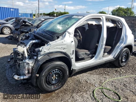 ✅ 2022 Chevrolet Trax LS • VIN: KL7CJNSM8NB551339 • Lot: 86807785. Listed on Copart with 26,783 mi. Free auction sales archive from the USA and detailed vehicle history report at DreamBid. Image 1.