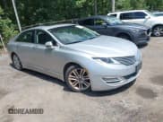 ✅ 2014 Lincoln MKZ • VIN: 3LN6L2G99ER823949 • Lot: 42848503. Listed on IAAI with 142,599 mi. Free auction sales archive from the USA and detailed vehicle history report at DreamBid. Image 1.