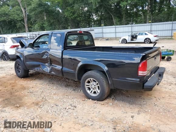 2004 Dodge Dakota Sport z VIN 1D7GL32K64S573944, wystawiony jako Copart lot #65445125 z przebiegiem 159 375 mil mil oraz Szkoda całkowita • Salvage title. Historia ofert i sprzedaży dostępna na DreamBid. Obrazek 2.