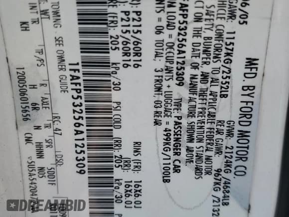 ✅ 2006 Ford Taurus SE • VIN: 1FAFP53256A125309 • Lot: 80096585. Listed on Copart with 243,463 mi. Free auction sales archive from the USA and detailed vehicle history report at DreamBid. Image 12.