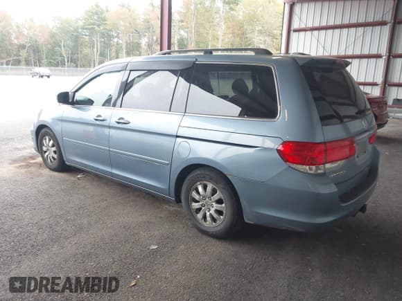 ✅ 2010 Honda Odyssey EX-L • VIN: 5FNRL3H60AB016923 • Lot: 43277237. Listed on IAAI with 166,257 mi. Free auction sales archive from the USA and detailed vehicle history report at DreamBid. Image 3.