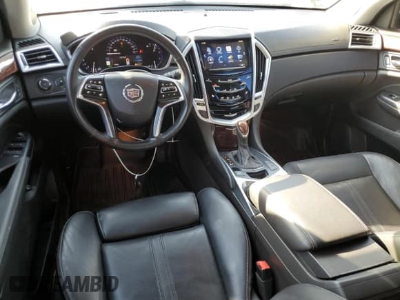 ✅ 2015 Cadillac SRX Performance Collection • VIN: 3GYFNFE33FS629992 • Lot: 82061395. Listed on Copart with 111,944 mi. Free auction sales archive from the USA and detailed vehicle history report at DreamBid. Image 8.