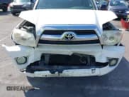 ✅ 2006 Toyota 4Runner SR5 • VIN: JTEZU14R260070050 • Lot: 43282870. Listed on IAAI with 204,244 mi. Free auction sales archive from the USA and detailed vehicle history report at DreamBid. Image 6.