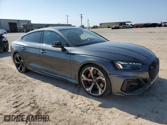 ✅ 2022 Audi RS 5 Sportback • VIN: WUAAWCF51NA900739 • Lot: 55451595. Listed on Copart with 88,652 mi. Free auction sales archive from the USA and detailed vehicle history report at DreamBid. Image 4.
