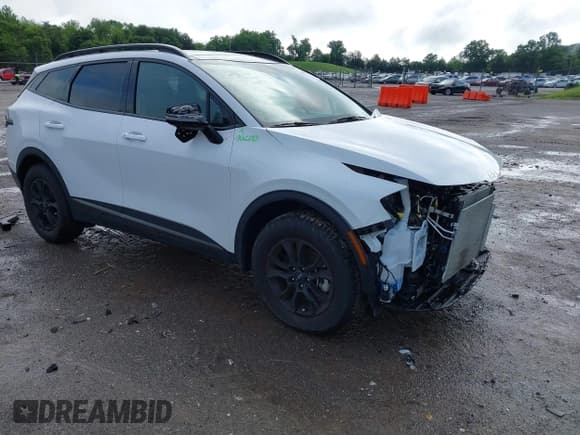 ✅ 2023 Kia Sportage X-Pro Prestige • VIN: 5XYK7CAF6PG135612 • Lot: 42244280. Listed on IAAI with 7,084 mi. Free auction sales archive from the USA and detailed vehicle history report at DreamBid. Image 1.