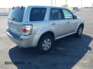 ✅ 2009 Mercury Mariner • VIN: 4M2CU81719KJ21370 • Lot: 43002562. Wystawiony na IAAI z przebiegiem 155 704 mil. Bezpłatny archiwum sprzedaży aukcyjnych z USA i szczegółowy raport historii pojazdu na DreamBid. Zdjęcie 4.