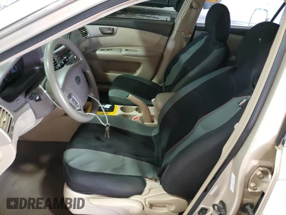 ✅ 2007 Kia Optima LX • VIN: KNAGE123175121675 • Lot: 64497064. Wystawiony na Copart z przebiegiem 224 822 mil. Bezpłatny archiwum sprzedaży aukcyjnych z USA i szczegółowy raport historii pojazdu na DreamBid. Zdjęcie 7.