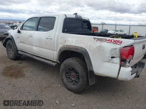 ✅ 2017 Toyota Tacoma SR5 • VIN: 3TMCZ5AN8HM077203 • Lot: 41765910. Listed on IAAI with 170,863 mi. Free auction sales archive from the USA and detailed vehicle history report at DreamBid. Image 3.