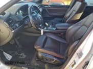 ✅ 2015 BMW X4 xDrive28i • VIN: 5UXXW3C52F0M87926 • Lot: 94218295. Listed on Copart with 94,567 mi. Free auction sales archive from the USA and detailed vehicle history report at DreamBid. Image 7.