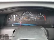 ✅ 1999 Nissan Frontier XE • VIN: 1N6ED26Y7XC311224 • Lot: 86131865. Wystawiony na Copart z przebiegiem 264 415 mil. Bezpłatny archiwum sprzedaży aukcyjnych z USA i szczegółowy raport historii pojazdu na DreamBid. Zdjęcie 9.