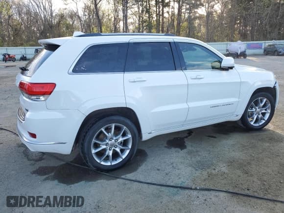 ✅ 2015 Jeep Grand Cherokee Summit • VIN: 1C4RJEJG0FC118974 • Lot: 49002165. Listed on Copart with 112,463 mi. Free auction sales archive from the USA and detailed vehicle history report at DreamBid. Image 3.