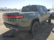 ✅ 2022 Rivian R1T Launch Edition • VIN: 7FCTGAAL5NN004623 • Lot: 47966085. Wystawiony na Copart z przebiegiem 28 798 mil. Bezpłatny archiwum sprzedaży aukcyjnych z USA i szczegółowy raport historii pojazdu na DreamBid. Zdjęcie 3.