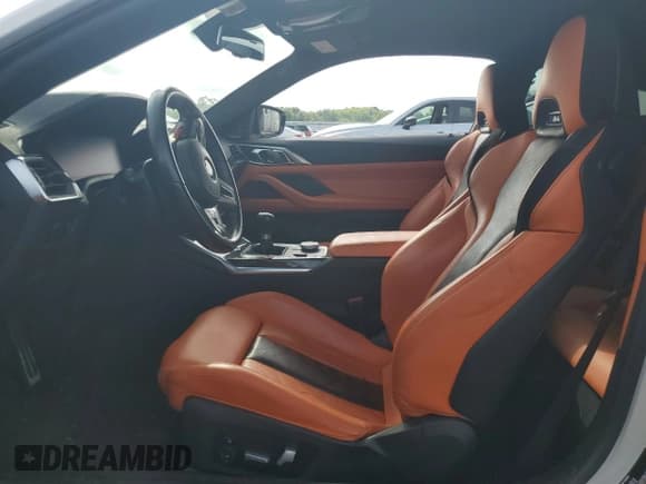 ✅ 2022 BMW M4 • VIN: WBS53AZ05NCH86997 • Lot: 65124395. Listed on Copart with 69,657 mi. Free auction sales archive from the USA and detailed vehicle history report at DreamBid. Image 7.