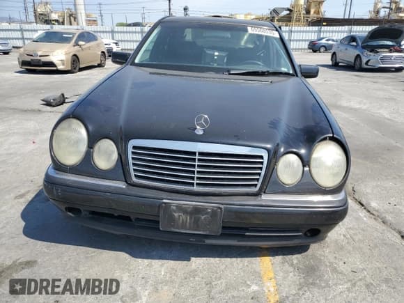 ✅ 1999 Mercedes-Benz E 320 • VIN: WDBJF65H7XA900885 • Lot: 65560535. Listed on Copart with 294,808 mi. Free auction sales archive from the USA and detailed vehicle history report at DreamBid. Image 5.