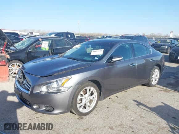 ✅ 2014 Nissan Maxima S • VIN: 1N4AA5AP4EC476676 • Lot: 41853243. Listed on IAAI with 104,616 mi. Free auction sales archive from the USA and detailed vehicle history report at DreamBid. Image 2.