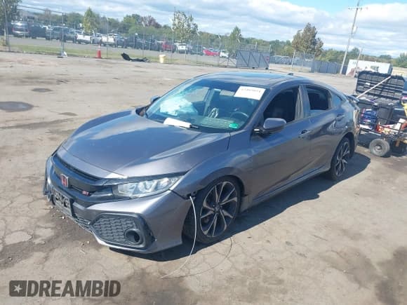 ✅ 2018 Honda Civic Si • VIN: 2HGFC1E5XJH706001 • Lot: 43403054. Listed on IAAI with 147,602 mi. Free auction sales archive from the USA and detailed vehicle history report at DreamBid. Image 17.