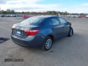 ✅ 2018 Toyota Corolla LE • VIN: 2T1BURHE5JC019684 • Lot: 43434106. Listed on IAAI with 104,991 mi. Free auction sales archive from the USA and detailed vehicle history report at DreamBid. Image 4.