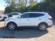 ✅ 2013 Hyundai Santa Fe Sport • VIN: 5XYZW3LA6DG051157 • Лот: 43521428. Опубликован ранее на IAAI с пробегом 152 906 миль. Бесплатный доступ к архиву аукционных продаж из США и подробный отчёт об истории автомобиля на DreamBid. Изображение 15.