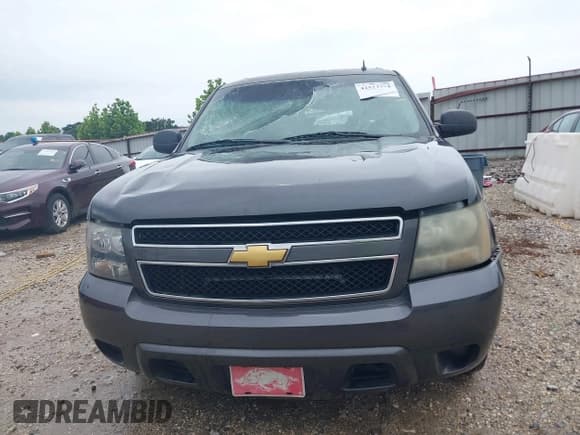 ✅ 2010 Chevrolet Suburban LS • VIN: 1GNUCHE07AR213838 • Lot: 42523274. Listed on IAAI with 251,109 mi. Free auction sales archive from the USA and detailed vehicle history report at DreamBid. Image 12.