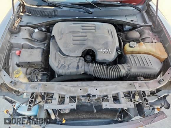 2012 Dodge Charger SE с VIN 2C3CDXBG3CH171706, выставлен на аукционе Copart как лот 71076475 с пробегом 159 142 миль миль и Списание • Salvage title. История ставок и продаж доступна на DreamBid. Изображение 11.