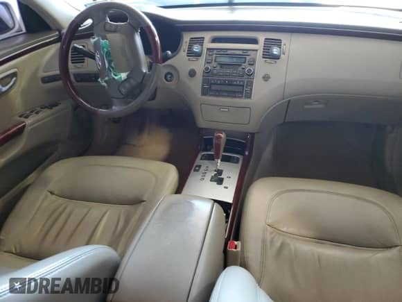 2006 Hyundai Azera SE с VIN KMHFC46F96A136033, выставлен на аукционе Copart как лот 53430715 с пробегом Не указан миль и Списание • Salvage title. История ставок и продаж доступна на DreamBid. Изображение 8.