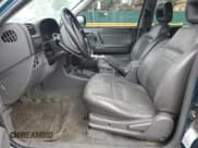 ✅ 1999 Isuzu Rodeo S • VIN: 4S2CM58W5X4313060 • Lot: 62211235. Wystawiony na Copart z przebiegiem 157 222 mil. Bezpłatny archiwum sprzedaży aukcyjnych z USA i szczegółowy raport historii pojazdu na DreamBid. Zdjęcie 7.