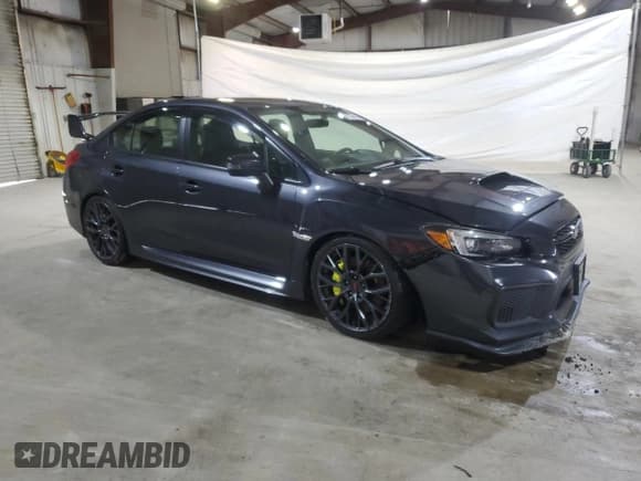 ✅ 2018 Subaru WRX STI • VIN: JF1VA2N60J9827947 • Lot: 91576435. Listed on Copart with 125,554 mi. Free auction sales archive from the USA and detailed vehicle history report at DreamBid. Image 4.