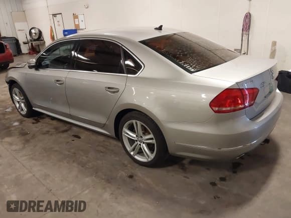 ✅ 2013 Volkswagen Passat SEL Premium • VIN: 1VWCN7A37DC092760 • Lot: 42963701. Listed on IAAI with 100,420 mi. Free auction sales archive from the USA and detailed vehicle history report at DreamBid. Image 3.