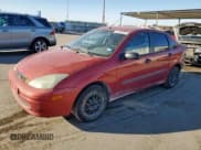 ✅ 2004 Ford Focus LX • VIN: 1FAFP33P74W110259 • Lot: 91582205. Listed on Copart with 219,594 mi. Free auction sales archive from the USA and detailed vehicle history report at DreamBid. Image 1.