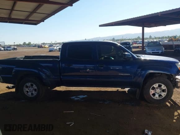 ✅ 2005 Toyota Tacoma • VIN: 5TEMU52N55Z106639 • Lot: 43704673. Listed on IAAI with 229,815 mi. Free auction sales archive from the USA and detailed vehicle history report at DreamBid. Image 14.