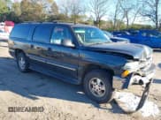 ✅ 2003 Chevrolet Suburban LT • VIN: 1GNEC16Z23J159956 • Lot: 40920994. Listed on IAAI with 255,603 mi. Free auction sales archive from the USA and detailed vehicle history report at DreamBid. Image 1.