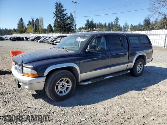 ✅ 2003 Dodge Dakota SLT • VIN: 1D7HL48N03S299182 • Lot: 53520675. Wystawiony na Copart z przebiegiem Nie podano. Bezpłatny archiwum sprzedaży aukcyjnych z USA i szczegółowy raport historii pojazdu na DreamBid. Zdjęcie 1.