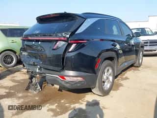 2022 Hyundai Tucson SEL with VIN 5NMJB3AE3NH133093, listed as a IAAI auction lot 43159380 with 33,721 mi miles and . Bid and sale history available at DreamBid. Image 4.