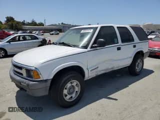 1997 Chevrolet Blazer LS с VIN 1GNDT13W0VK182395, выставлен на аукционе Copart как лот 60868525 с пробегом 458 469 миль миль и Списание • Salvage title. История ставок и продаж доступна на DreamBid. Изображение 1.