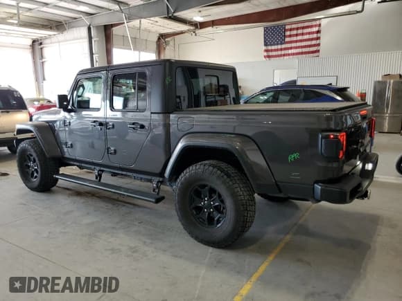 ✅ 2022 Jeep Gladiator Texas Trail • VIN: 1C6HJTAG7NL134613 • Лот: 70038155. Опубликован ранее на Copart с пробегом 52 438 миль. Бесплатный доступ к архиву аукционных продаж из США и подробный отчёт об истории автомобиля на DreamBid. Изображение 2.