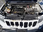 ✅ 2016 Jeep Compass 75th Anniversary • VIN: 1C4NJDBBXGD551791 • Lot: 86481765. Wystawiony na Copart z przebiegiem 142 847 mil. Bezpłatny archiwum sprzedaży aukcyjnych z USA i szczegółowy raport historii pojazdu na DreamBid. Zdjęcie 12.