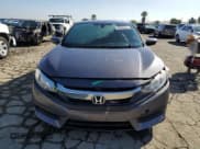 ✅ 2018 Honda Civic LX • VIN: 2HGFC4B51JH306320 • Lot: 86825845. Wystawiony na Copart z przebiegiem 83 345 mil. Bezpłatny archiwum sprzedaży aukcyjnych z USA i szczegółowy raport historii pojazdu na DreamBid. Zdjęcie 5.